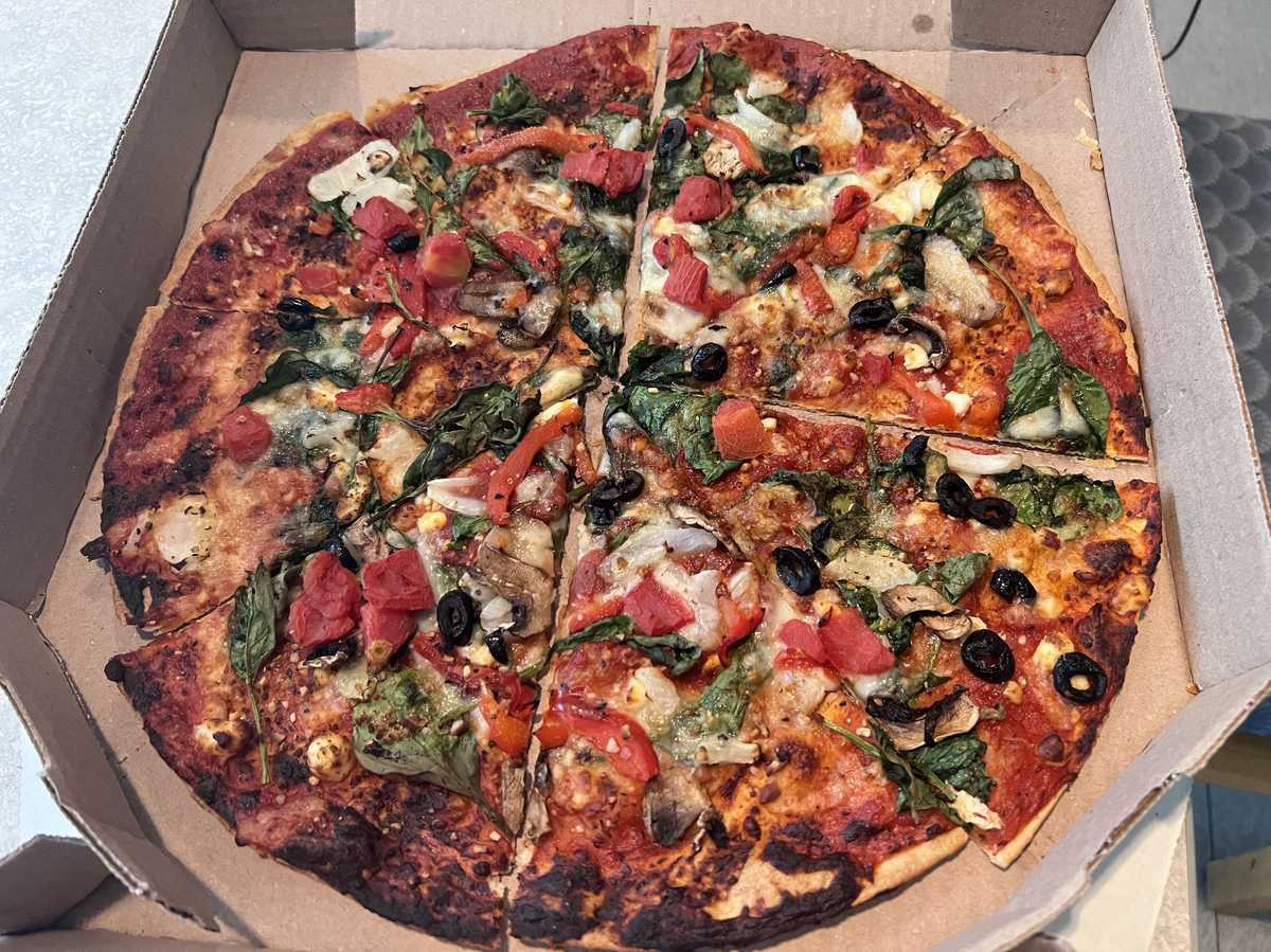 Dominos Pacific Veggie Pizza — source product photograph